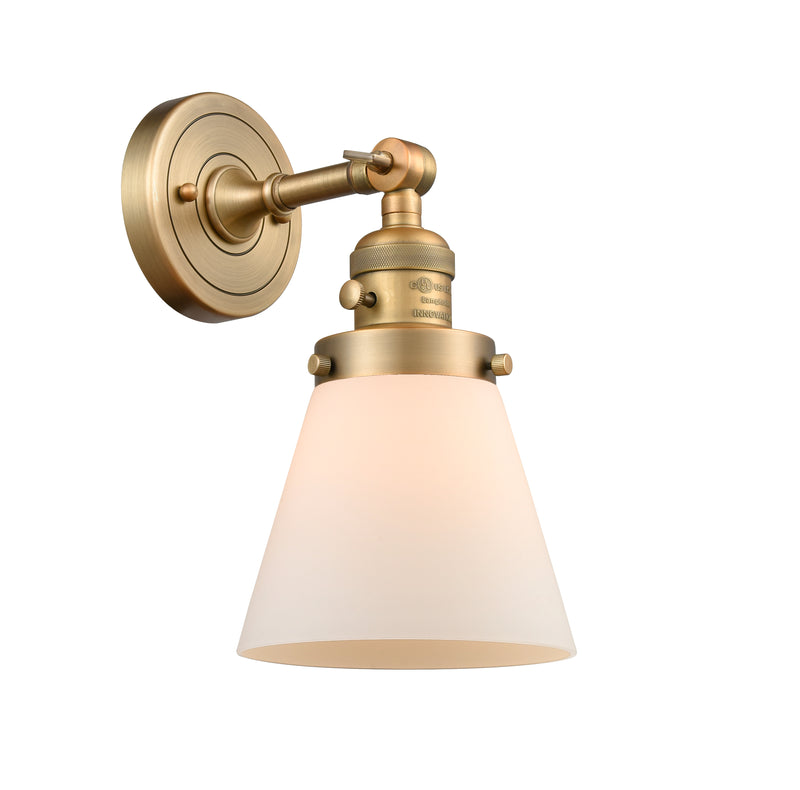 Innovations Lighting Small Cone 1-100 watt 6 inch Brushed Brass Sconce with Matte White Cased glass and Solid Brass 180 Degree Adjustable Swivel With Engraved Cast Cup Includes a "High-Low-Off" Switch. 203SWBBG61