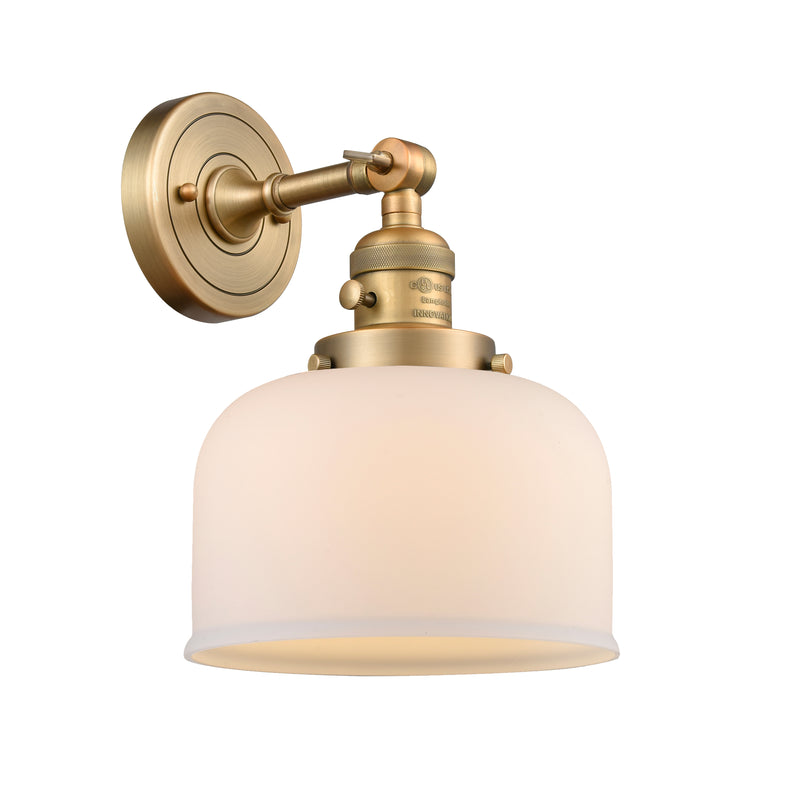 Innovations Lighting Large Bell 1-100 watt 8 inch Brushed Brass Sconce with Matte White Cased glass and Solid Brass 180 Degree Adjustable Swivel With Engraved Cast Cup Includes a "High-Low-Off" Switch. 203SWBBG71