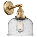 Bell Sconce shown in the Brushed Brass finish with a Seedy shade