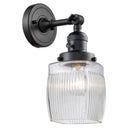 Colton Sconce shown in the Matte Black finish with a Clear Halophane shade