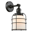 Bell Cage Sconce shown in the Matte Black finish with a Matte White shade