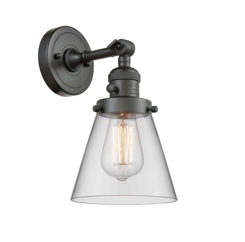 Innovations Lighting Small Cone 1-100 watt 6 inch Oil Rubbed Bronze Sconce with Clear glass and Solid Brass 180 Degree Adjustable Swivel With Engraved Cast Cup Includes a "High-Low-Off" Switch. 203SWOBG62