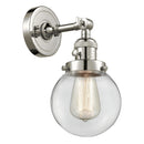 Beacon Sconce shown in the Polished Nickel finish with a Clear shade