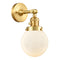 Beacon Sconce shown in the Satin Gold finish with a Matte White shade