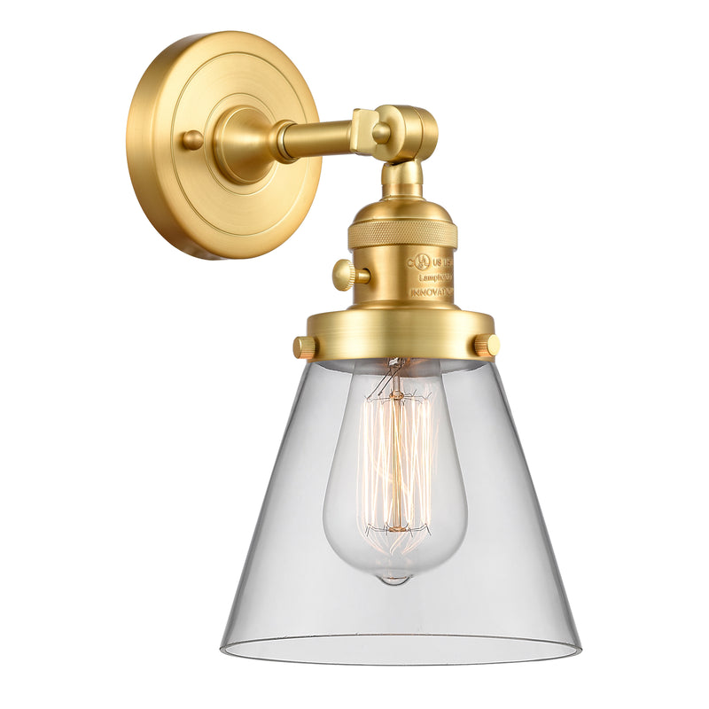 Cone Sconce shown in the Satin Gold finish with a Clear shade