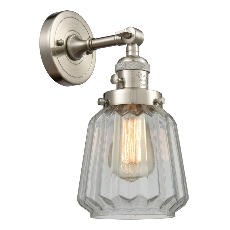 Chatham Sconce shown in the Brushed Satin Nickel finish with a Clear shade