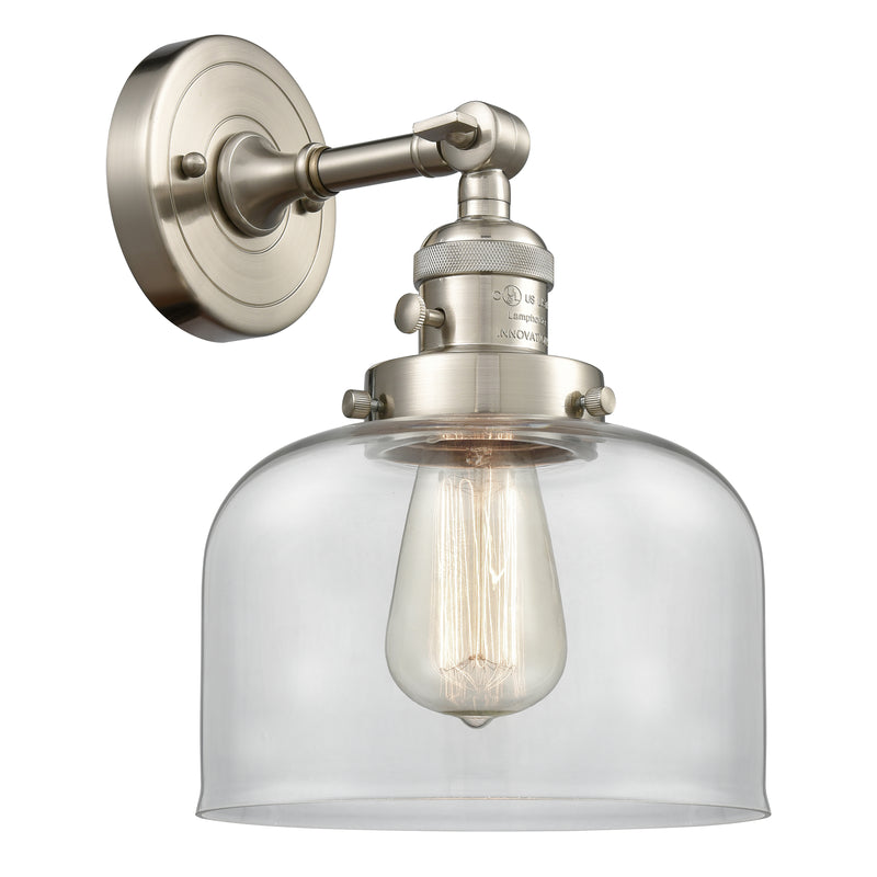 Bell Sconce shown in the Brushed Satin Nickel finish with a Clear shade