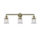 Canton Bath Vanity Light shown in the Antique Brass finish with a Clear shade