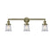 Canton Bath Vanity Light shown in the Antique Brass finish with a Clear shade