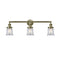 Canton Bath Vanity Light shown in the Antique Brass finish with a Clear shade