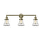 Bellmont Bath Vanity Light shown in the Antique Brass finish with a Clear shade