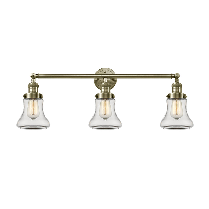 Bellmont Bath Vanity Light shown in the Antique Brass finish with a Clear shade