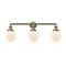 Beacon Bath Vanity Light shown in the Antique Brass finish with a Matte White shade