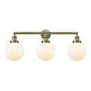 Beacon Bath Vanity Light shown in the Antique Brass finish with a Matte White shade