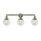 Beacon Bath Vanity Light shown in the Antique Brass finish with a Clear shade