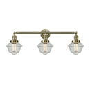 Oxford Bath Vanity Light shown in the Antique Brass finish with a Seedy shade