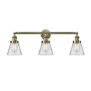 Cone Bath Vanity Light shown in the Antique Brass finish with a Clear shade