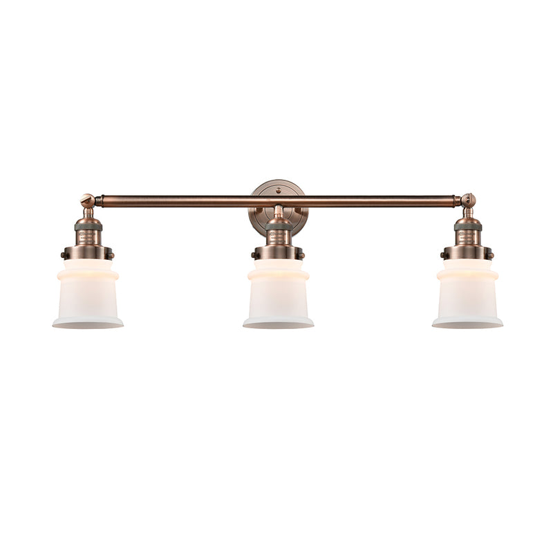 Canton Bath Vanity Light shown in the Antique Copper finish with a Matte White shade