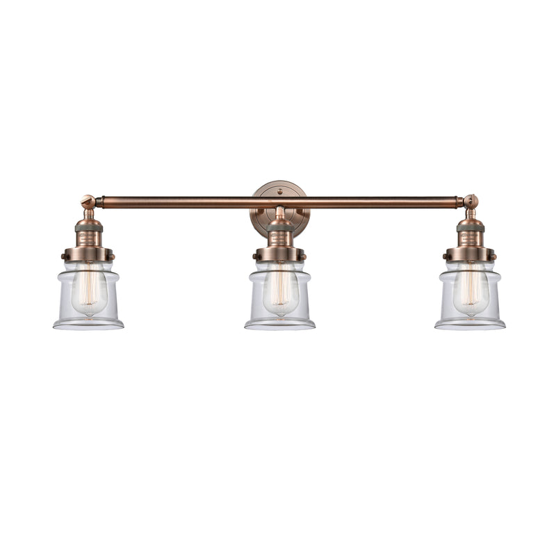 Canton Bath Vanity Light shown in the Antique Copper finish with a Clear shade