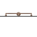 Beacon Bath Vanity Light shown in the Antique Copper finish with a Matte White shade