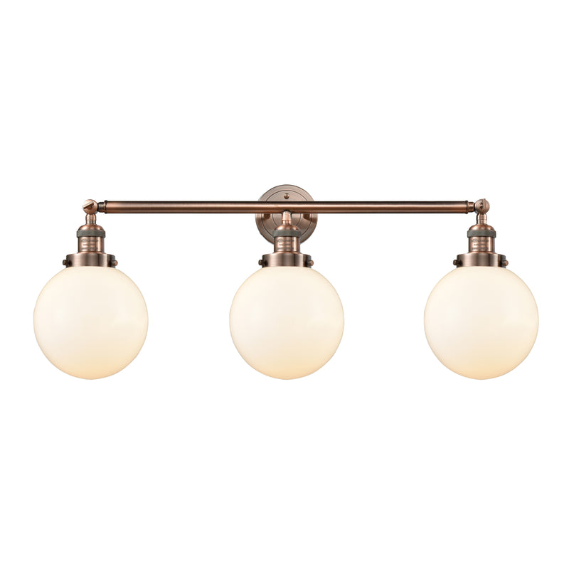 Beacon Bath Vanity Light shown in the Antique Copper finish with a Matte White shade