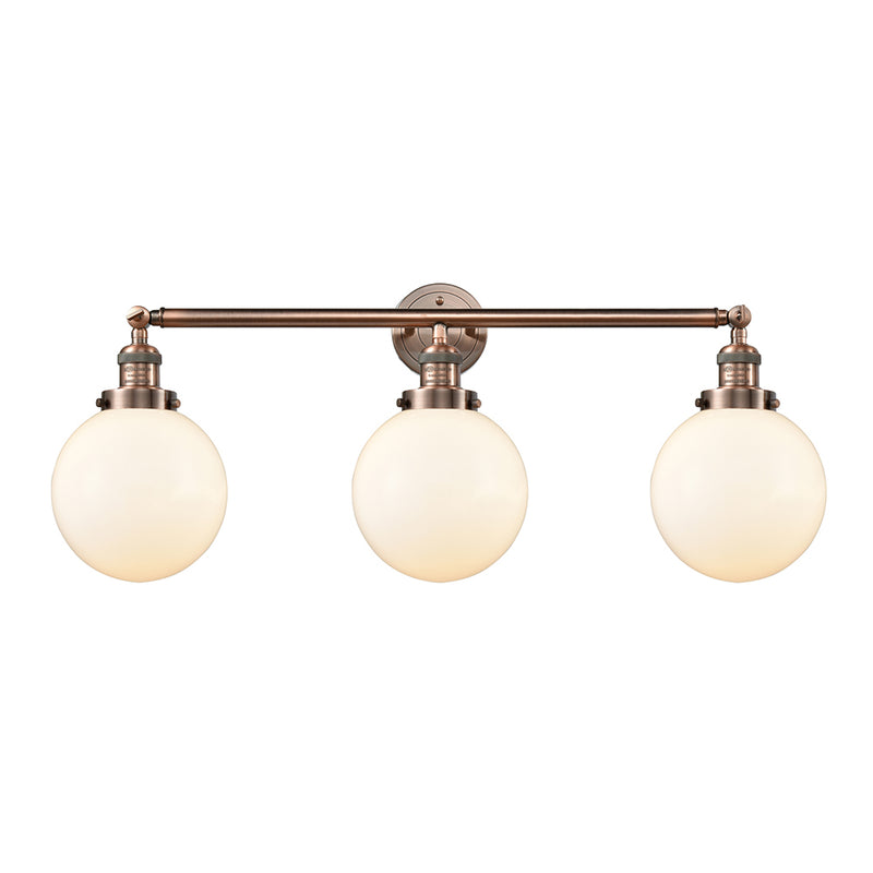 Beacon Bath Vanity Light shown in the Antique Copper finish with a Matte White shade