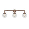 Beacon Bath Vanity Light shown in the Antique Copper finish with a Clear shade