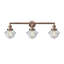 Oxford Bath Vanity Light shown in the Antique Copper finish with a Clear shade