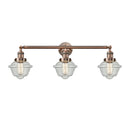 Oxford Bath Vanity Light shown in the Antique Copper finish with a Seedy shade