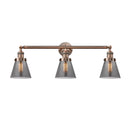 Cone Bath Vanity Light shown in the Antique Copper finish with a Plated Smoke shade