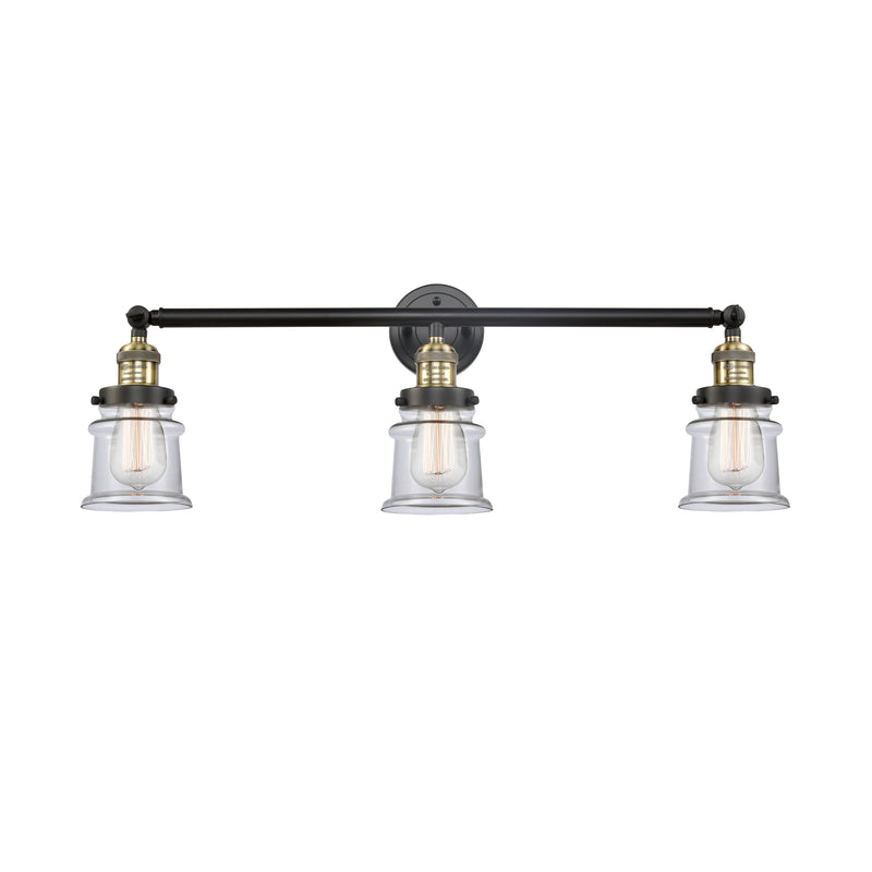 Canton Bath Vanity Light shown in the Black Antique Brass finish with a Clear shade