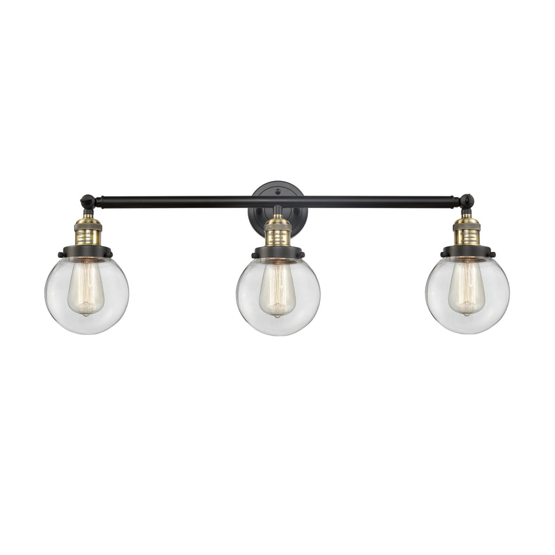 Beacon Bath Vanity Light shown in the Black Antique Brass finish with a Clear shade