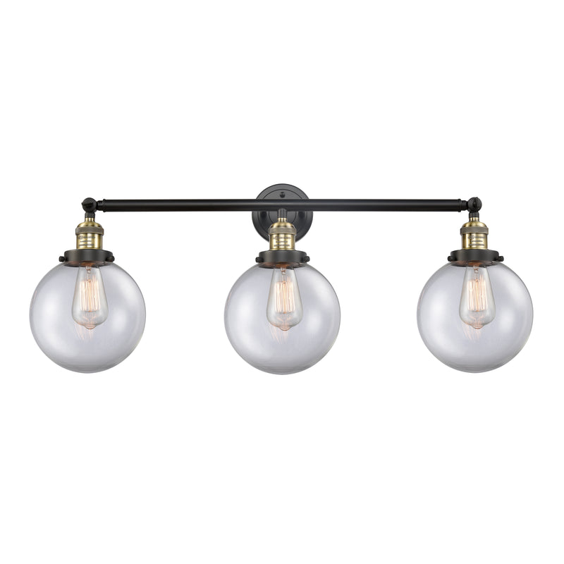 Beacon Bath Vanity Light shown in the Black Antique Brass finish with a Clear shade