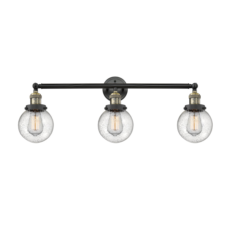 Beacon Bath Vanity Light shown in the Black Antique Brass finish with a Seedy shade