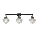 Oxford Bath Vanity Light shown in the Black Antique Brass finish with a Clear shade