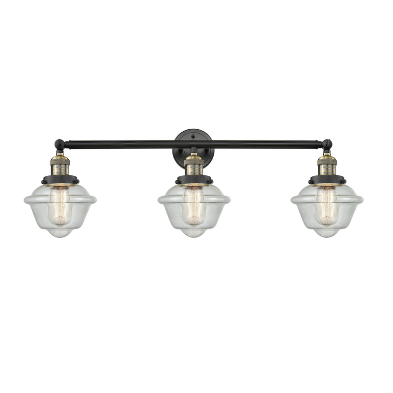 Oxford Bath Vanity Light shown in the Black Antique Brass finish with a Seedy shade