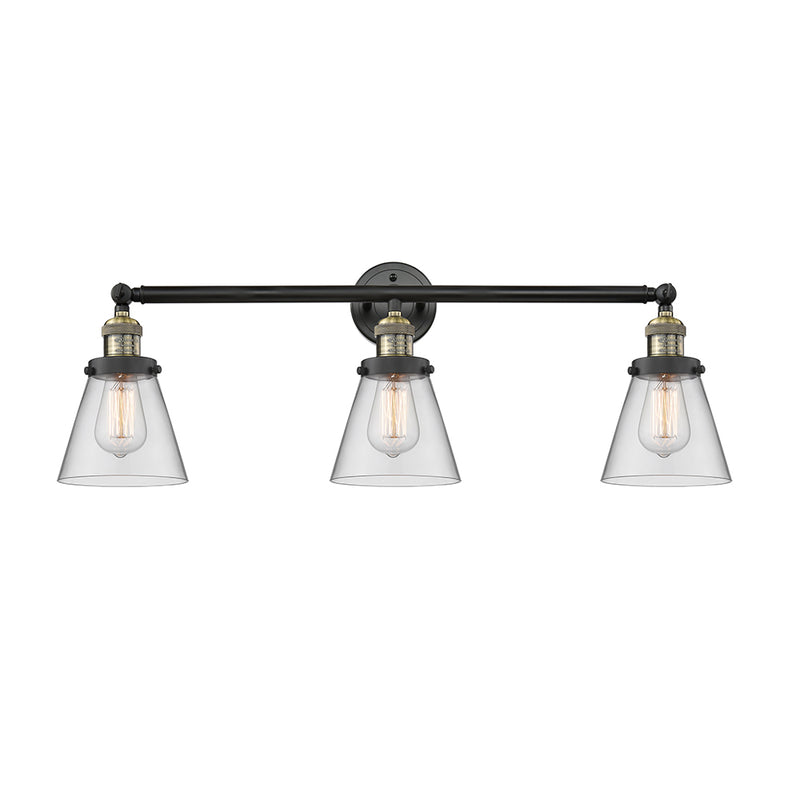 Cone Bath Vanity Light shown in the Black Antique Brass finish with a Clear shade