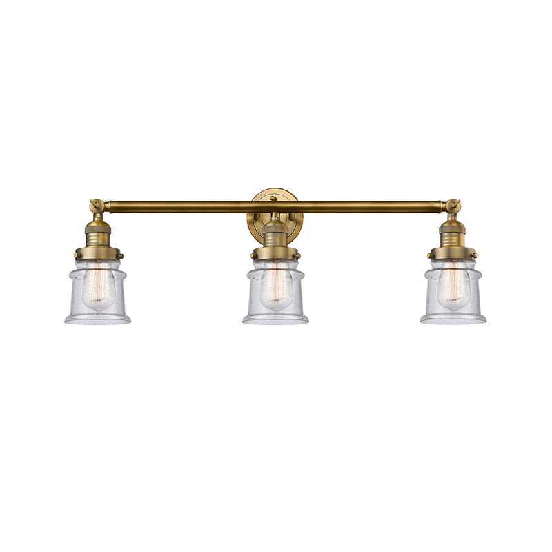 Canton Bath Vanity Light shown in the Brushed Brass finish with a Seedy shade