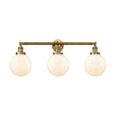 Beacon Bath Vanity Light shown in the Brushed Brass finish with a Matte White shade