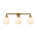 Beacon Bath Vanity Light shown in the Brushed Brass finish with a Matte White shade