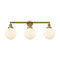 Beacon Bath Vanity Light shown in the Brushed Brass finish with a Matte White shade