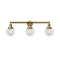 Beacon Bath Vanity Light shown in the Brushed Brass finish with a Clear shade