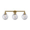 Beacon Bath Vanity Light shown in the Brushed Brass finish with a Clear shade