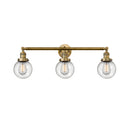 Beacon Bath Vanity Light shown in the Brushed Brass finish with a Seedy shade