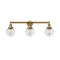 Beacon Bath Vanity Light shown in the Brushed Brass finish with a Seedy shade