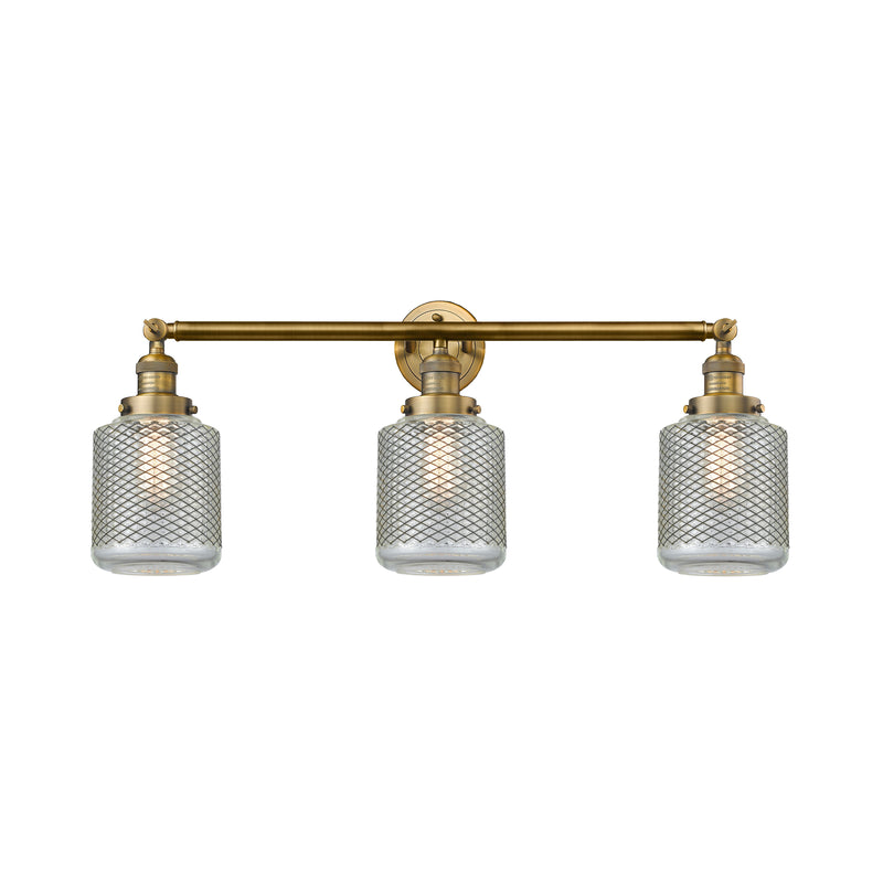 Stanton Bath Vanity Light shown in the Brushed Brass finish with a Clear Wire Mesh shade