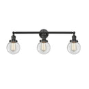 Beacon Bath Vanity Light shown in the Matte Black finish with a Clear shade