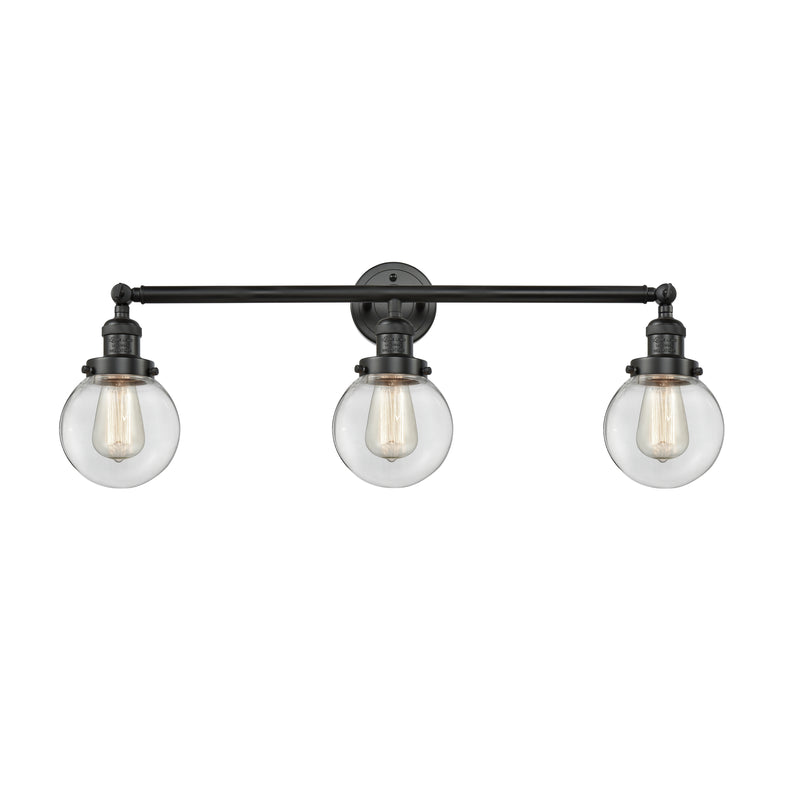 Beacon Bath Vanity Light shown in the Matte Black finish with a Clear shade