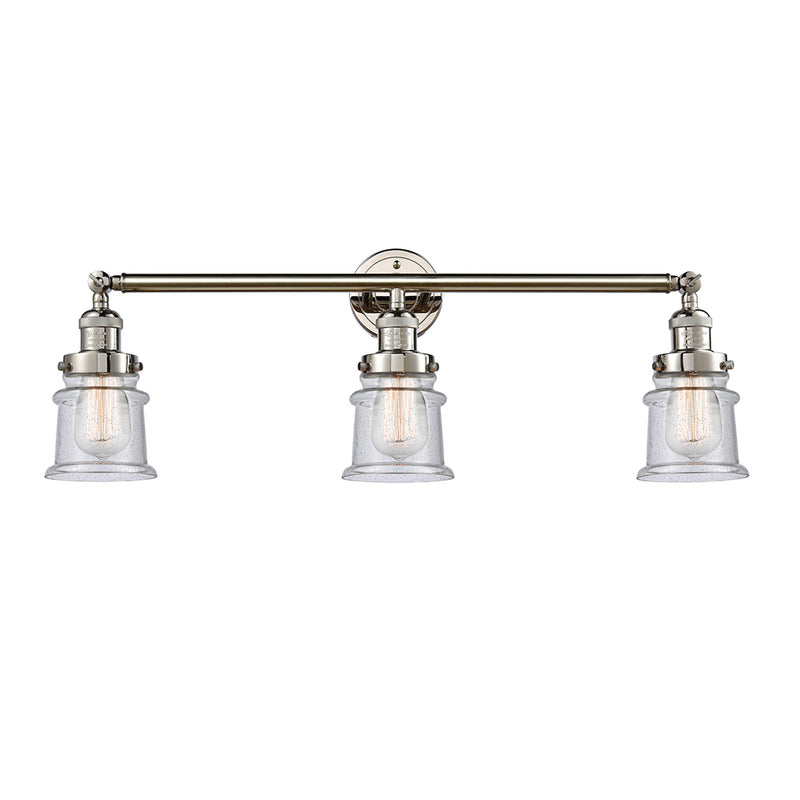 Canton Bath Vanity Light shown in the Polished Nickel finish with a Seedy shade