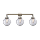 Beacon Bath Vanity Light shown in the Polished Nickel finish with a Clear shade